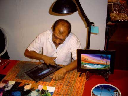 Oil Painting a Mexican scene with his fingers